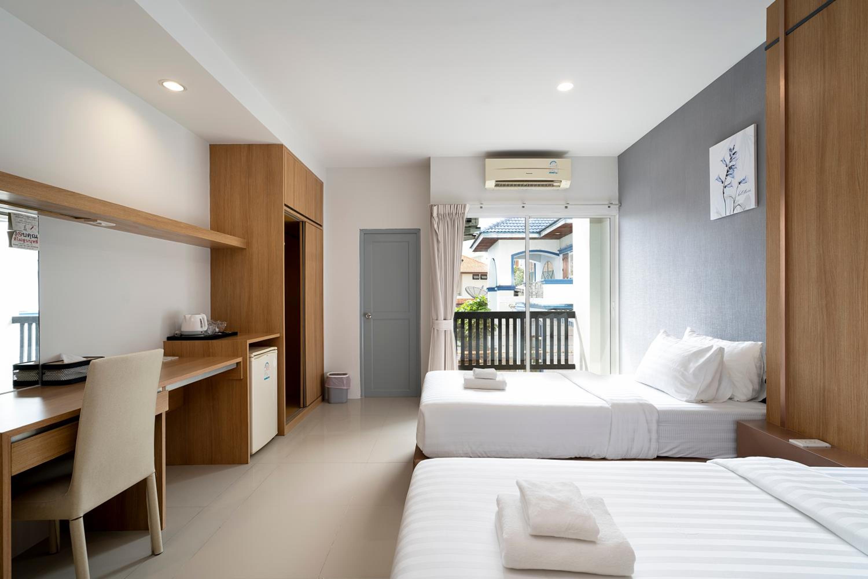 Foto de Riski Residence Ngamwongwan