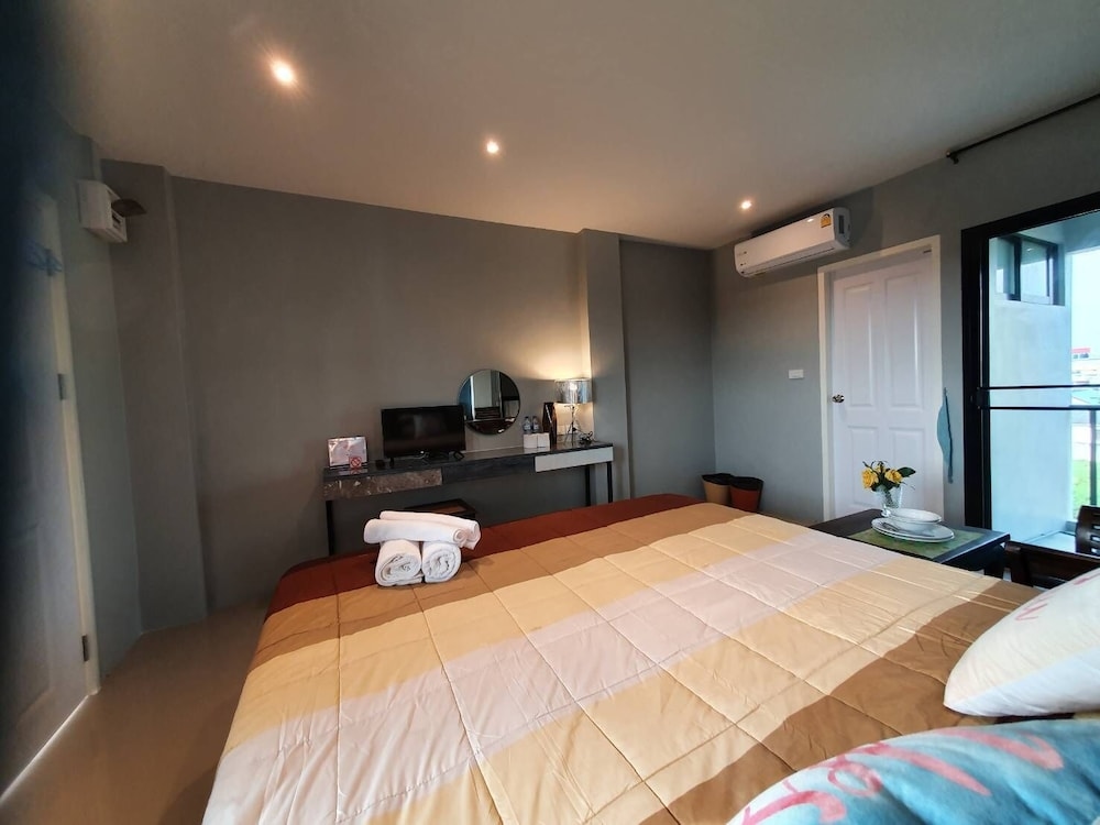 Foto de Samutsakorn Apartment